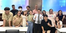 Group photo of the special lecturer, Teacher Kevin Cook, the TU students and Mr. Watcharapol Chuengcharoen, Chief of Networking and Collaboration, APCD. 