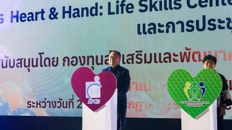 Picture 4: Mr. Piroon Laismit, Executive Director of APCD, stands on stage