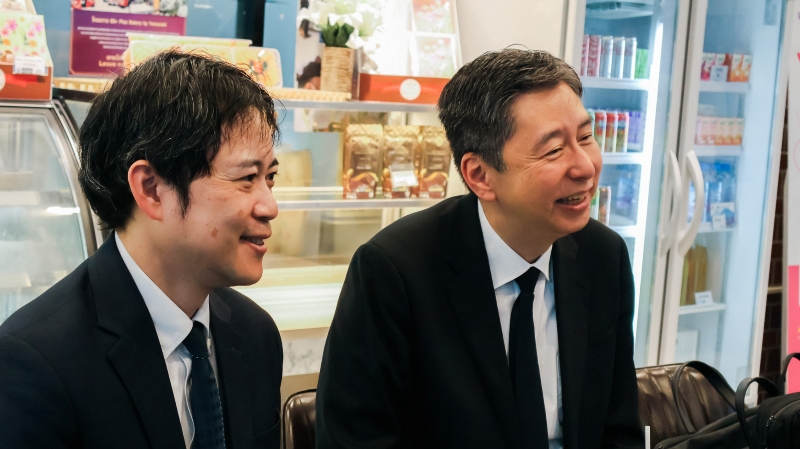 Mr. SHINODA Takanobu, Director of Southeast Asia Division 4, Southeast Asia and Pacific Department (left) and Mr. HAYAKAWA Yuho, Senior Vice President of JICA listen to the introduction of the APCD 60+ Plus Bakery & Chocolate Project from Mr. Piroon Laismit, Executive Director of APCD.