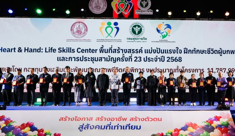 Picture 7: Participants pose for a group photo holding their awards