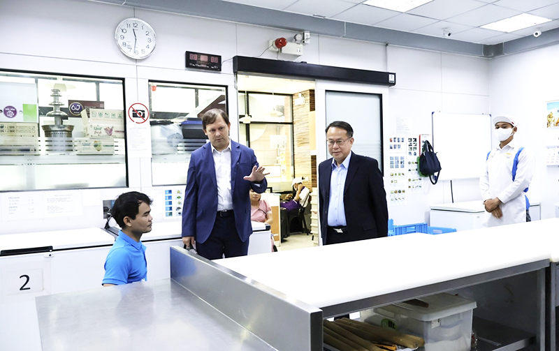 UNV ROAP team inspects the venue and the accessibility features of the 60+Plus Bakery & Café program, a disability inclusive business initiative by APCD.