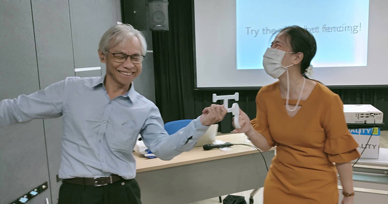 Mr. Somchai Rungsilp, Manager of Community Development Department, and Dr. Nantanoot Suwannawut, Director of International Cooperation Section, Division of Strategies and Plans, Department of Empowerment for Persons with Disabilities (DEP), also tried their hand at alphabet sports fencing.