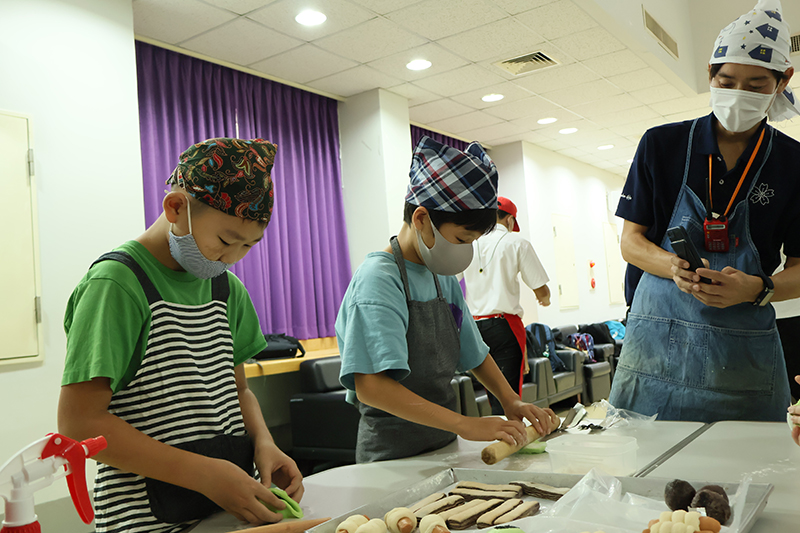 In a bid to foster inclusivity and cultural exchange, students and teachers from the Thai-Japanese Association School embarked on a unique culinary journey at the Asia-Pacific Development Center on Disability (APCD) today, February 6, 2024. The focal point of their visit? A hands-on workshop centered around the art of baking with a special focus on Yamazaki bakery delicacies. Under the guidance of seasoned chefs and facilitators, participants immersed themselves in the intricate process of crafting Yamazaki bakery treats. From mastering dough techniques to perfecting the art of shaping and decorating pastries, the workshop provided a platform for both learning and creativity. What set this event apart, however, was its emphasis on inclusivity. With APCD's commitment to creating an accessible environment for all, the workshop was tailored to accommodate diverse needs and abilities. Students and teachers alike were able to engage fully in the baking experience, breaking down barriers and fostering a sense of unity. "The essence of today's workshop goes beyond baking," remarked one of the organizers. "It's about creating an environment where everyone feels valued and included, regardless of any differences. Food has a remarkable power to bring people together, and today, we witnessed the beauty of that unity." For the students of the Thai-Japanese Association School, the workshop served as a window into Japanese culture and culinary traditions, enriching their educational journey with practical experiences and cross-cultural insights. As the aroma of freshly baked goods filled the air and laughter echoed through the halls of APCD, it was evident that the workshop had achieved its goal of fostering not only culinary skills but also a sense of belonging and understanding among all participants. With initiatives like these paving the way, the journey towards a more inclusive society takes a significant step forward, one delicious recipe at a time.