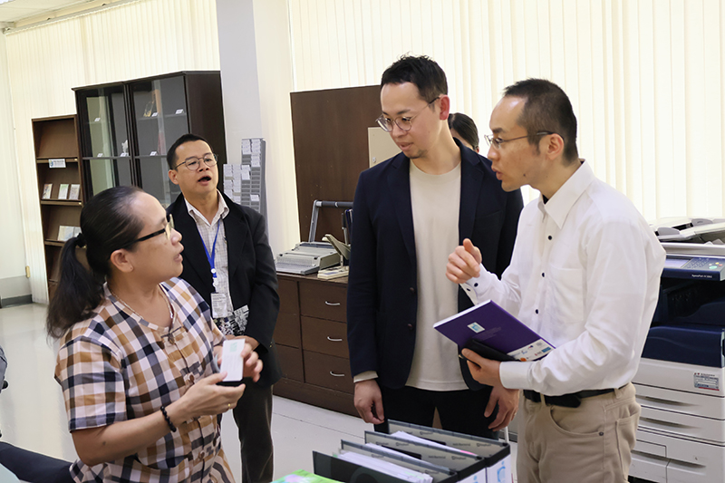 Mr. Yosuke and Mr. Yoshio, greet Ms. Kularb Gaysornsri, APCD Administrative Manager, during the office tour at APCD.