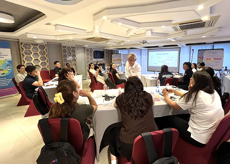 Participants learned on how to mobilize resources, facilitated by Mr. Somchai, on 25 November.