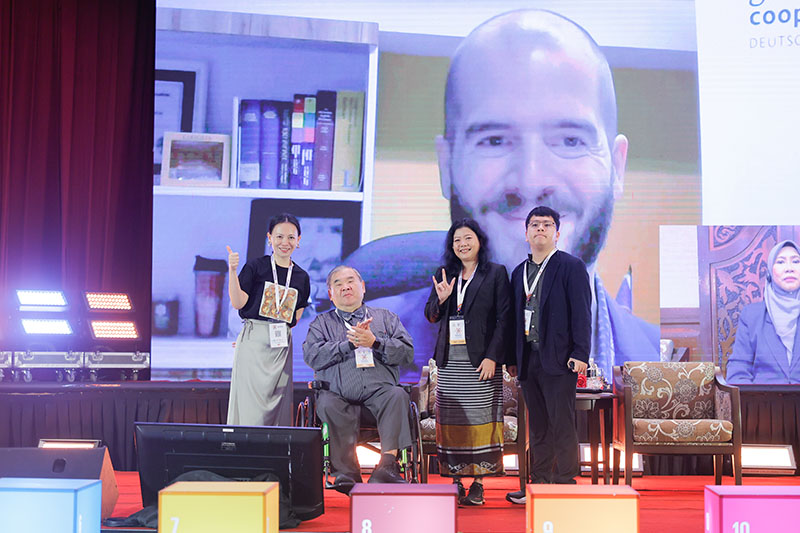 Group photo of Session 5: Powering Inclusion - Financing a Future Without Barriers on December 4, youth panelists, featuring, Mr. Chayoot representing Thailand.