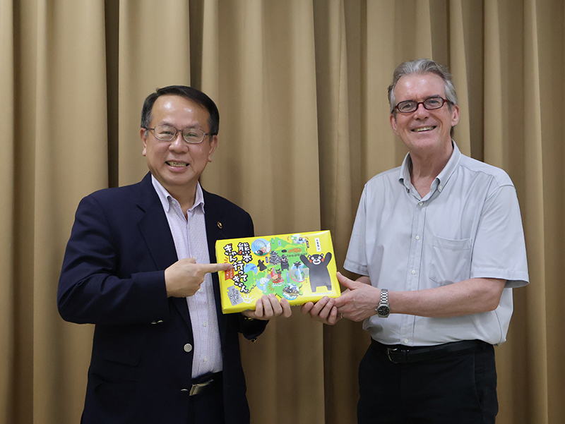 On behalf of the group, Professor Jeffery Morrow gave sweet gift from Kumamoto Japan, as a token of appreciation to Mr. Piroon.