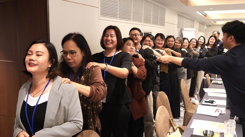 Photo 8: Participants engage in ice-breaking activities to build connections and foster a positive learning environment.