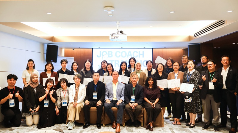 Photo 9: Participants pose for a group photo with their certificates upon completing the Job Coach Training, marking their achievement and commitment to supporting disability-inclusive employment.