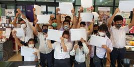 Participants, resource persons, and project staff gathered in a group shot.