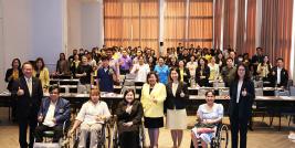 A group photo featuring participants, organizers, and workshop facilitators.