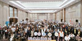 Group photo of more than hundred participants included business sectors, companies, speakers, organizer and persons with disabilities at the opening ceremony.