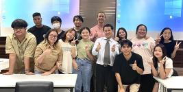 Group photo of the special lecturer, Teacher Kevin Cook, the TU students and Mr. Watcharapol Chuengcharoen, Chief of Networking and Collaboration, APCD. 