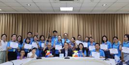 Group photo of delegates from VAN with their completion certificates of the study tour, posing together with APCD staff on 19 February, the day that the group visited APCD and received their certificates.