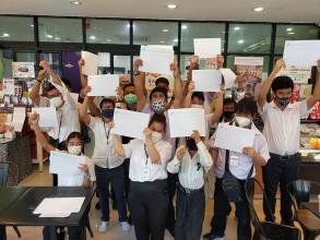 Participants, resource persons, and project staff gathered in a group shot.