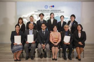 Group photo of representatives from TICA, JICA Thailand Office and relevant agencies at TICA-JICA handover ceremony of 3 Japanese Volunteers including APCD 