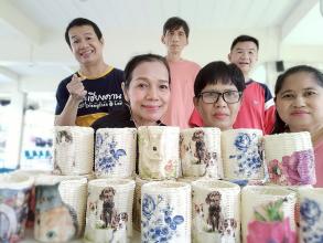 Members of the Dao Ruang Group gather for a group photo after a successful fundraising event on the half day activity.