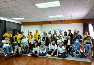 The organizers and participants pose together for a warm group photo to open CP World Day, filled with positive energy and happy hearts ready to share smiles.