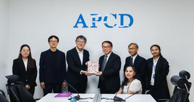 Picture 1: From left to right, Ms. Nuntaporn Sittidetboripat, Mr. SAKUDO Shunsuke, Mr. KOBAYASHI Hiroyuki (left) and Mr. Piroon Laismit (right), both holding a gift together, Mr. Somchai Rungsilp, Ms. Nongnuch Maytarjittipun (seated in a wheelchair in front of Mr. Somchai Rungsilp), and Ms. Siriporn Praserdchat pose for a group photo