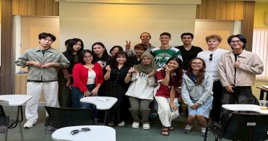 A group picture of an APCD representative, Ms. Thorfan Dechachainimit, with 15 students and Professor Kavin Cook in class on Civil Society Management.